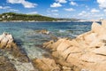 Colourful Early Summer View of the Northern Coast of Sardinia at Baia Sardinia  With Rocks and Turquoise Mediterranean. Italy. Royalty Free Stock Photo